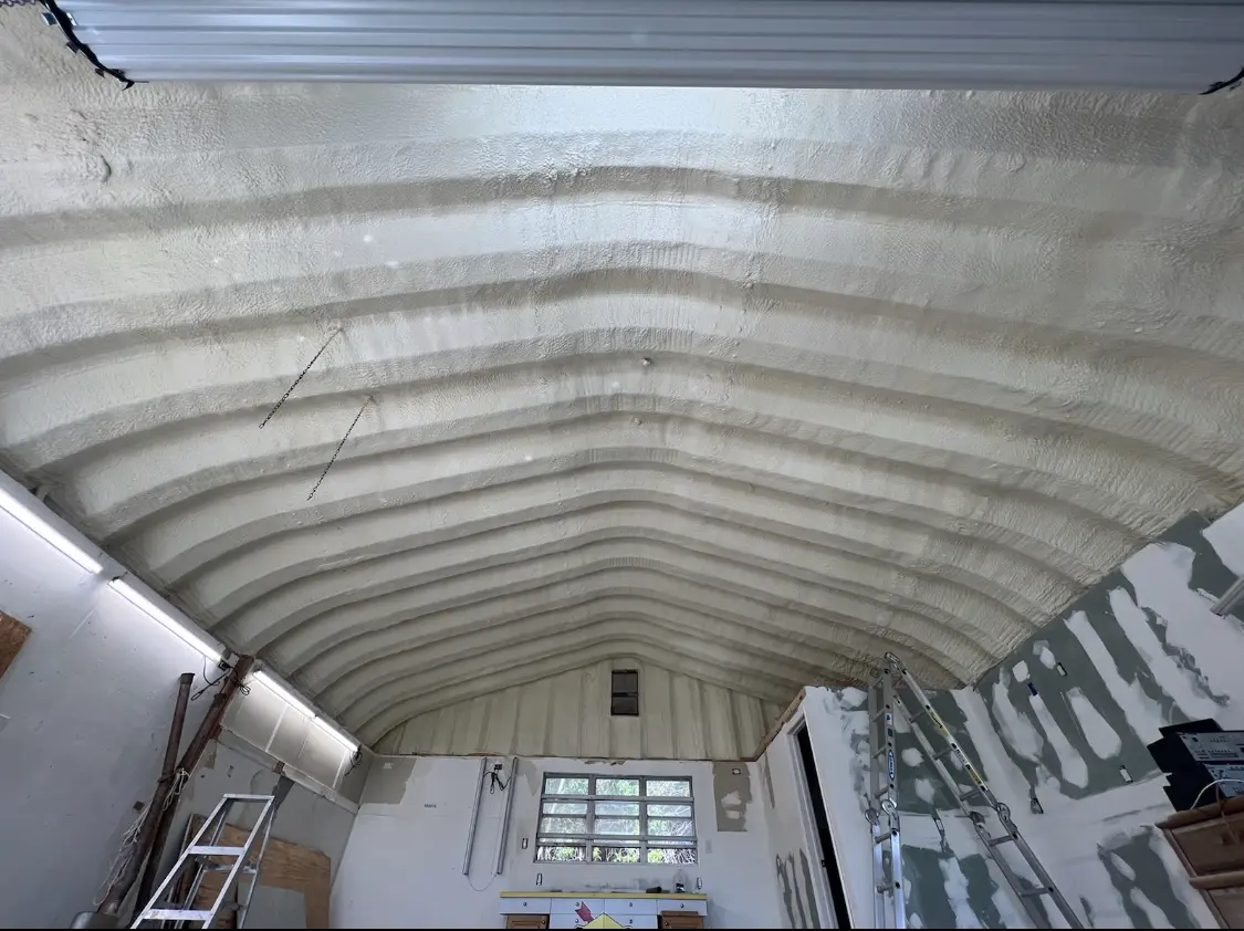 Spray polyurethane foam applied to the underside of a metal roof deck in Thibodaux